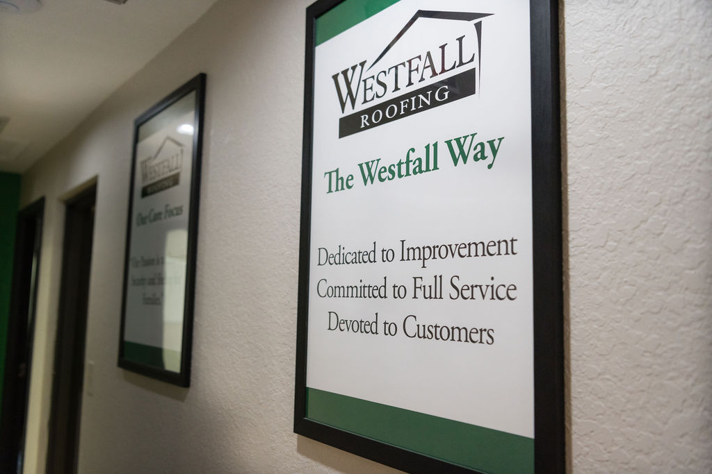 wall art showing The Westfall Way: Dedicated to Improvement, Committed to Full Service, Devoted to Customers