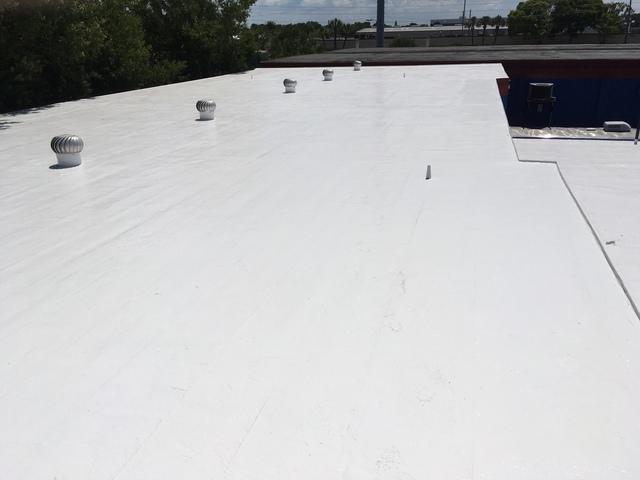 white flat roof replacement