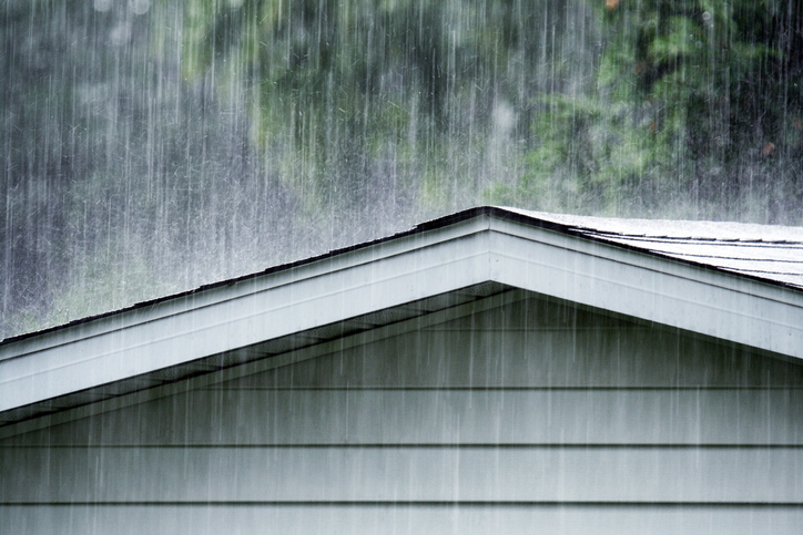 heavy rains falling on a roof