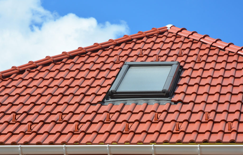 new skylight on a metal tile roof