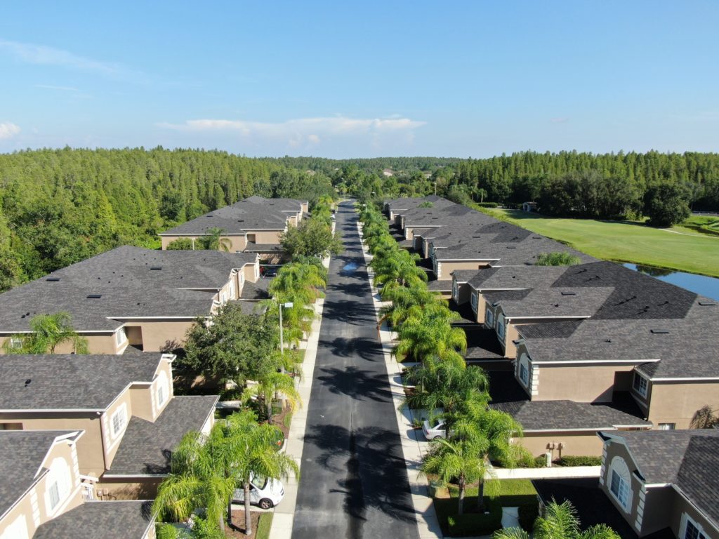 Roof replacements on homes in a Tampa neighborhood.