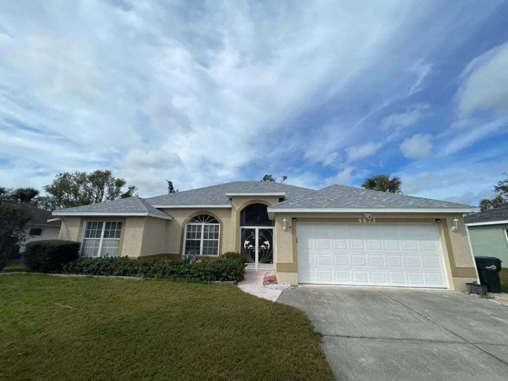 Stucco Home with roof replacement