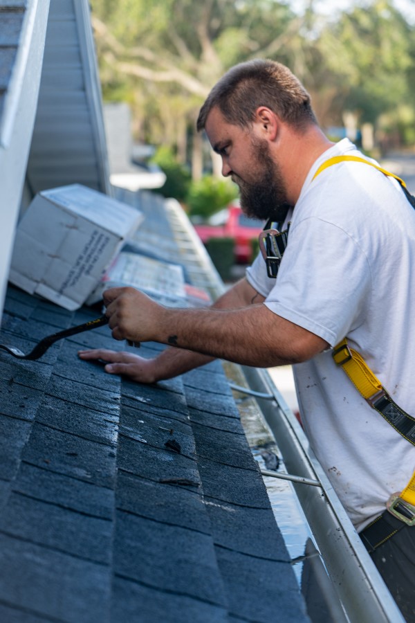 Westfall Roofing roofing contractor performing asphalt shingle roof repairs in Sarasota