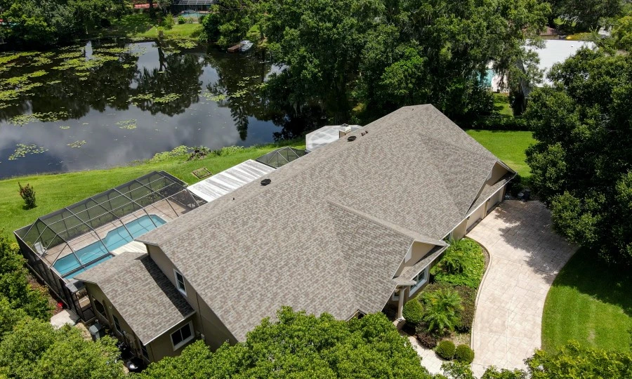 Home with Gable roof and pool out back